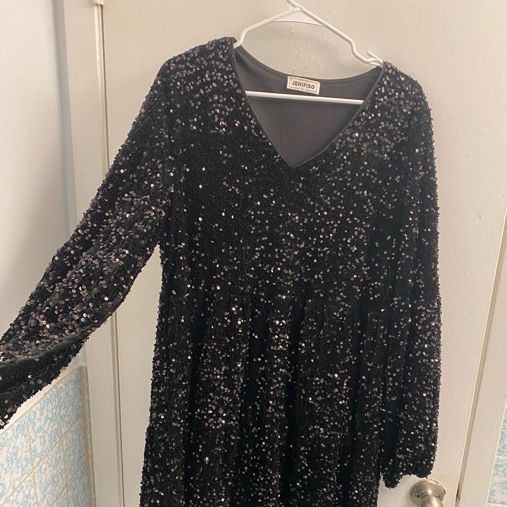 - black sequin XL dress
- pretty heavy material, great for winter